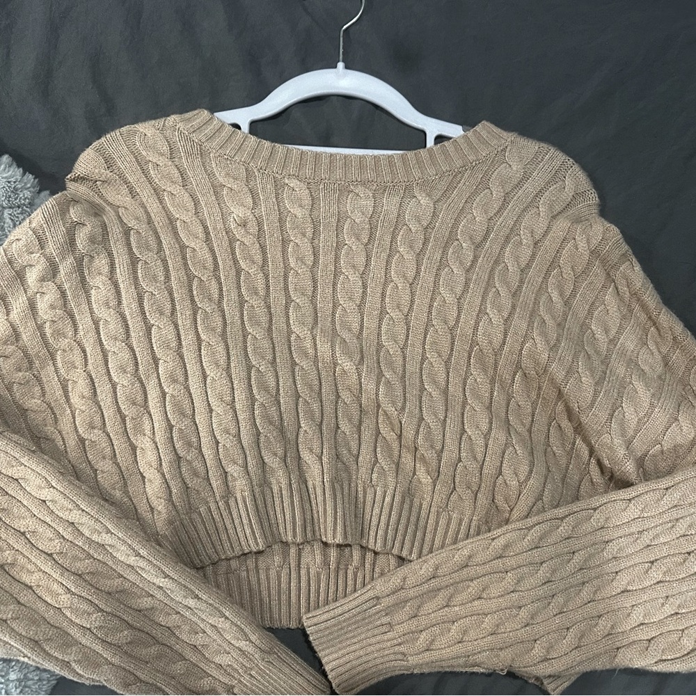 Cropped sweater alters state